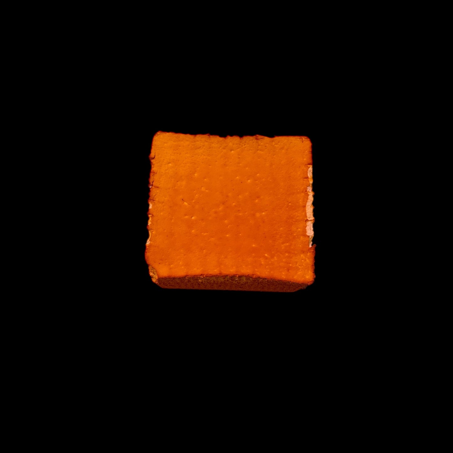 One (1) Orange Small Block